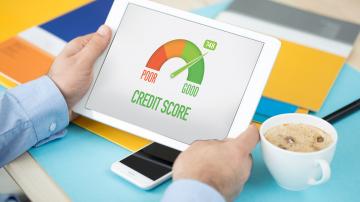 Man looking at credit score
